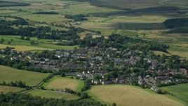 5.5K aerial stock footage of an orbit of the Scottish village of Kippen, Scotland Aerial Stock Footage | AX110_031E