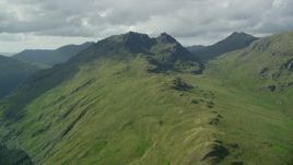 5.5K aerial stock footage of The Cobbler, a green mountain peak, Scottish Highlands, Scotland Aerial Stock Footage | AX110_070E