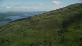 5.5K aerial stock footage approach blue waters of Loch Lomond, Scottish Highlands Aerial Stock Footage | AX110_101E
