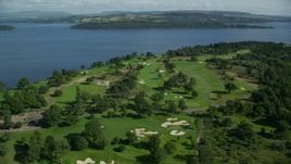 5.5K aerial stock footage of an orbit of Loch Lomond Golf Course, Luss, Scottish Highlands, Scotland Aerial Stock Footage | AX110_116E