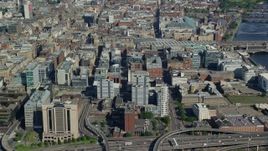 5.5K aerial stock footage of approach city office buildings in Glasgow, Scotland Aerial Stock Footage | AX110_157