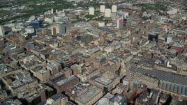 5.5K aerial stock footage of passing city buildings, Glasgow, Scotland Aerial Stock Footage | AX110_159