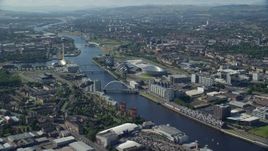 5.5K aerial stock footage of Scotland's National Arena and Clyde Auditorium across River Clyde, Glasgow, Scotland Aerial Stock Footage | AX110_169E