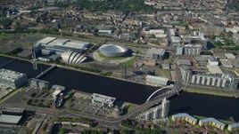 5.5K aerial stock footage of Scotland's National Arena and Clyde Auditorium beside the River Clyde, Glasgow, Scotland Aerial Stock Footage | AX110_172