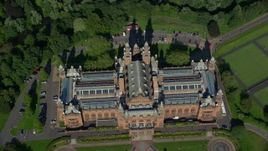 5.5K aerial stock footage of bird's eye of Kelvingrove Art Gallery and Museum, Glasgow, Scotland Aerial Stock Footage | AX110_178