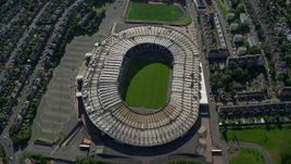 5.5K aerial stock footage tilt to bird's eye view of the Hampden Park soccer stadium, Glasgow, Scotland Aerial Stock Footage | AX110_194