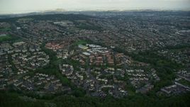 5.5K aerial stock footage of suburban neighborhoods in Edinburgh, Scotland Aerial Stock Footage | AX111_108E