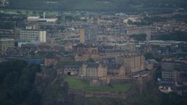5.5K aerial stock footage of flying by Edinburgh Castle and cityscape, Scotland Aerial Stock Footage | AX111_155E