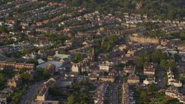 5.5K aerial stock footage of Saint Ninian's Church and residential neighborhood, Edinburgh, Scotland at sunset Aerial Stock Footage | AX112_002E