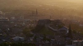 5.5K aerial stock footage of The Hub and Edinburgh Castle, Scotland at sunset Aerial Stock Footage | AX112_024E