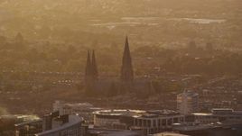 5.5K aerial stock footage video of St Mary's Cathedral, Edinburgh, Scotland at sunset Aerial Stock Footage | AX112_028