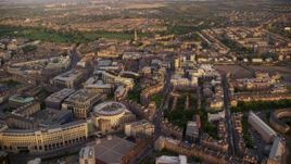 5.5K aerial stock footage of panning across office buildings, Edinburgh, Scotland at sunset Aerial Stock Footage | AX112_082