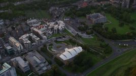 5.5K aerial stock footage of the Dynamic Earth science center and Scottish Parliament, Scotland at sunset Aerial Stock Footage | AX112_087