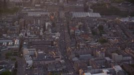 5.5K aerial stock footage of orbiting University of Edinburgh School of Law, Scotland  at sunset Aerial Stock Footage | AX112_103E