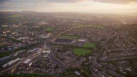 5.5K aerial stock footage of flying by Murrayfield Stadium, Edinburgh, Scotland at sunset Aerial Stock Footage | AX112_109E