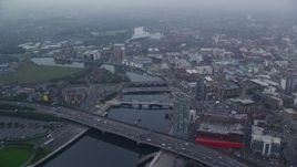 5.5K aerial stock footage of bridges over River Lagan, Belfast, Northern Ireland Aerial Stock Footage | AX113_087