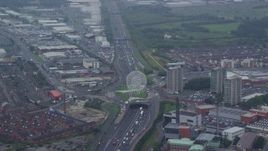 5.5K aerial stock footage of the Rise sculpture and M1 Freeway, Belfast, Northern Ireland Aerial Stock Footage | AX113_093E