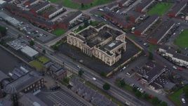 5.5K aerial stock footage of orbiting an abandoned courthouse, Belfast, Northern Ireland Aerial Stock Footage | AX113_111