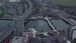 5.5K aerial stock footage of Queen's Bridge and M3 Highway over River Lagan, Belfast, Northern Ireland Aerial Stock Footage | AX113_118