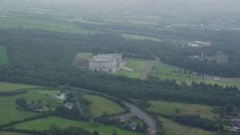 5.5K aerial stock footage video of Parliament Buildings, grounds and trees, Belfast, Northern Ireland Aerial Stock Footage | AX113_123E
