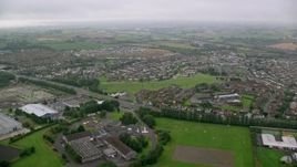 5.5K aerial stock footage of passing by residential neighborhoods, Belfast, Northern Ireland Aerial Stock Footage | AX113_128