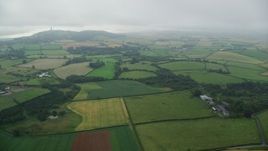 5.5K aerial stock footage of farms and farm fields on the way to Scrabo Tower, Newtownards, Northern Ireland Aerial Stock Footage | AX113_132