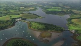 5.5K aerial stock footage of Quoile Yacht Club in Strangford Lough, Downpatrick, Northern Ireland Aerial Stock Footage | AX113_157E