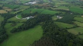 5.5K aerial stock footage fly over farms and green fields, Downpatrick, Northern Ireland Aerial Stock Footage | AX113_162E