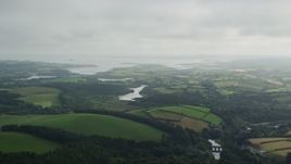 5.5K aerial stock footage of farmland near the water, Downpatrick, Northern Ireland Aerial Stock Footage | AX113_166