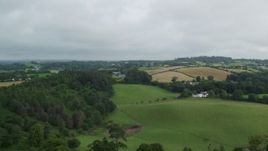 5.5K aerial stock footage of trees and farmland, Downpatrick, Northern Ireland Aerial Stock Footage | AX113_168