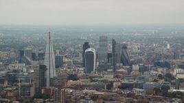 5.5K aerial stock footage approach The Shard Central and skyscrapers in Central London, England Aerial Stock Footage | AX114_019