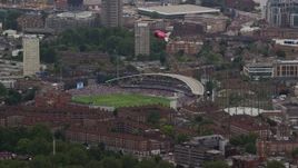 5.5K aerial stock footage of a cricket game at The Oval and a blimp, London, England Aerial Stock Footage | AX114_020