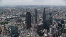 5.5K aerial stock footage orbiting Gherkin and Heron Tower, reveal The Shard in London, England Aerial Stock Footage | AX114_025E