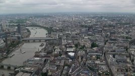 5.5K aerial stock footage of approaching St Paul's Cathedral near River Thames, Central London, England Aerial Stock Footage | AX114_038