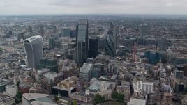 5.5K aerial stock footage fly between The Gherkin and Leadenhall Building skyscrapers, Central London, England Aerial Stock Footage | AX114_061E