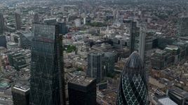 5.5K aerial stock footage fly between The Gherkin and Leadenhall Building skyscrapers, Central London, England Aerial Stock Footage | AX114_063