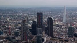 5.5K aerial stock footage flyby skyscrapers revealing The Shard, Central London, England Aerial Stock Footage | AX114_067E