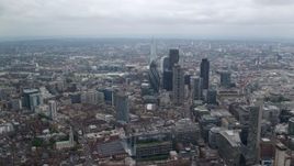 5.5K aerial stock footage of approaching The Gherkin skyscraper in Central London, England Aerial Stock Footage | AX114_070E