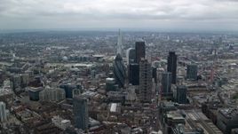 5.5K aerial stock footage approaching The Gherkin skyscraper with view of The Shard, Central London, England Aerial Stock Footage | AX114_071