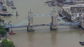 5.5K aerial stock footage of orbiting Tower Bridge spanning River Thames, London, England Aerial Stock Footage | AX114_083E