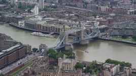 5.5K aerial stock footage of orbiting Tower Bridge and Tower of London, England Aerial Stock Footage | AX114_086