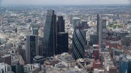 5.5K aerial stock footage of orbiting The Gherkin and Heron Tower skyscrapers, Central London, England Aerial Stock Footage | AX114_104E