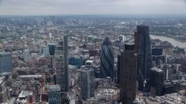 5.5K aerial stock footage orbiting Central London skyscrapers and city sprawl, England Aerial Stock Footage | AX114_113