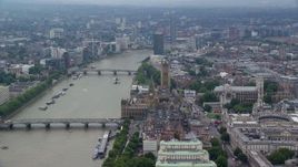 5.5K aerial stock footage of Big Ben and Parliament by the River Thames in London England Aerial Stock Footage | AX114_168E