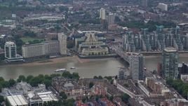 5.5K aerial stock footage of MI6 Building, and Vauxhall Bridge over River Thames, London, England Aerial Stock Footage | AX114_173E