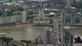 5.5K aerial stock footage of MI6 Building, and Vauxhall Bridge over River Thames, London, England Aerial Stock Footage | AX114_174