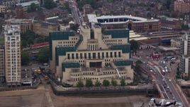 5.5K aerial stock footage of a close-up view of the MI6 Building, London, England Aerial Stock Footage | AX114_193