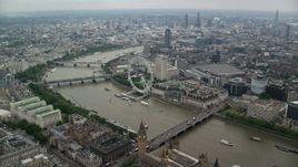 5.5K aerial stock footage fly over Big Ben and Westminster Bridge toward London Eye, England Aerial Stock Footage | AX114_197