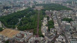 5.5K aerial stock footage follow The Mall to approach Buckingham Palace, London, England Aerial Stock Footage | AX114_204