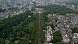 5.5K aerial stock footage of flying over The Mall toward Buckingham Palace, London, England Aerial Stock Footage | AX114_205